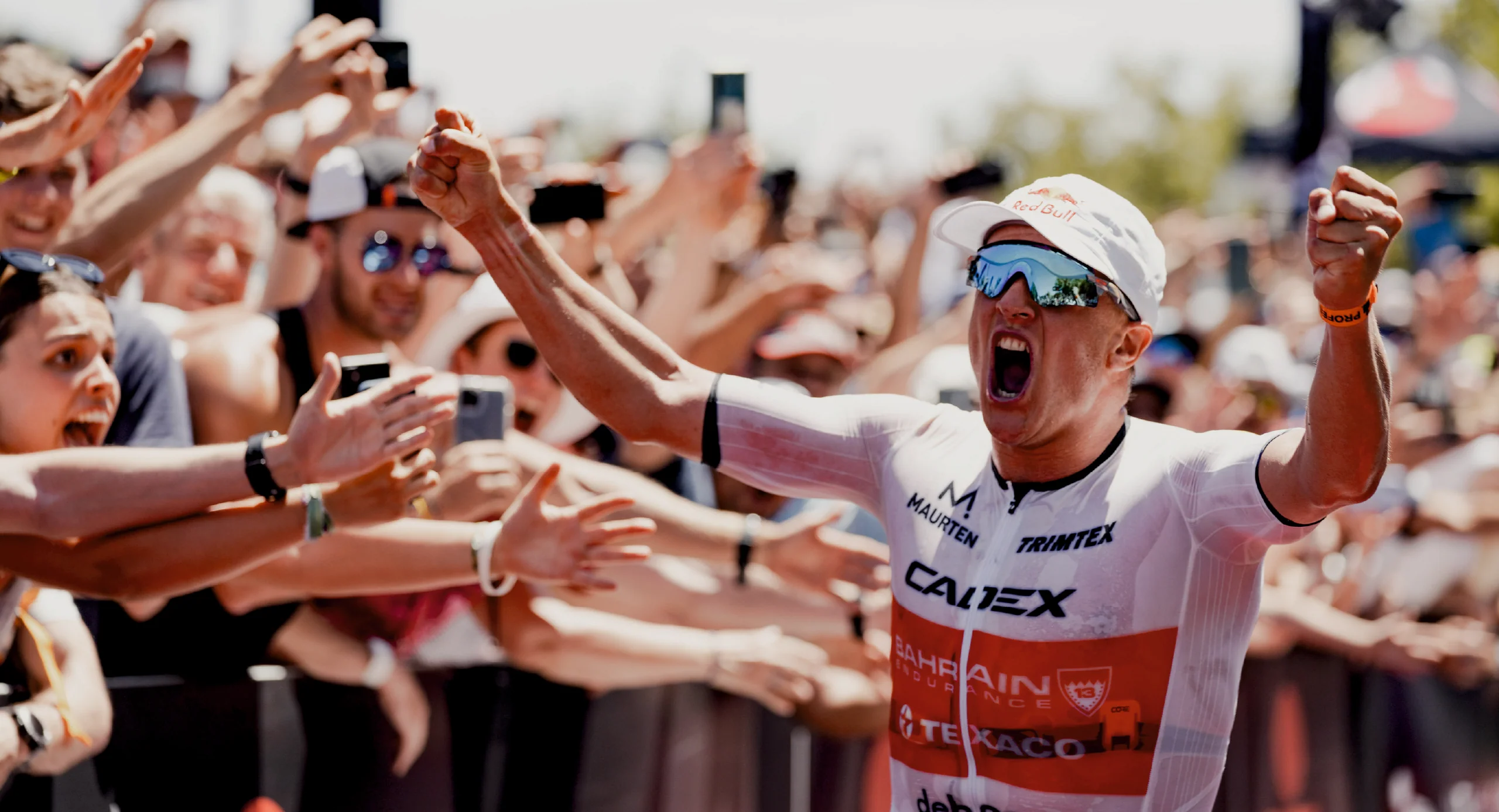 Kristian Blummenfelt winning in Trimtex athlete gear